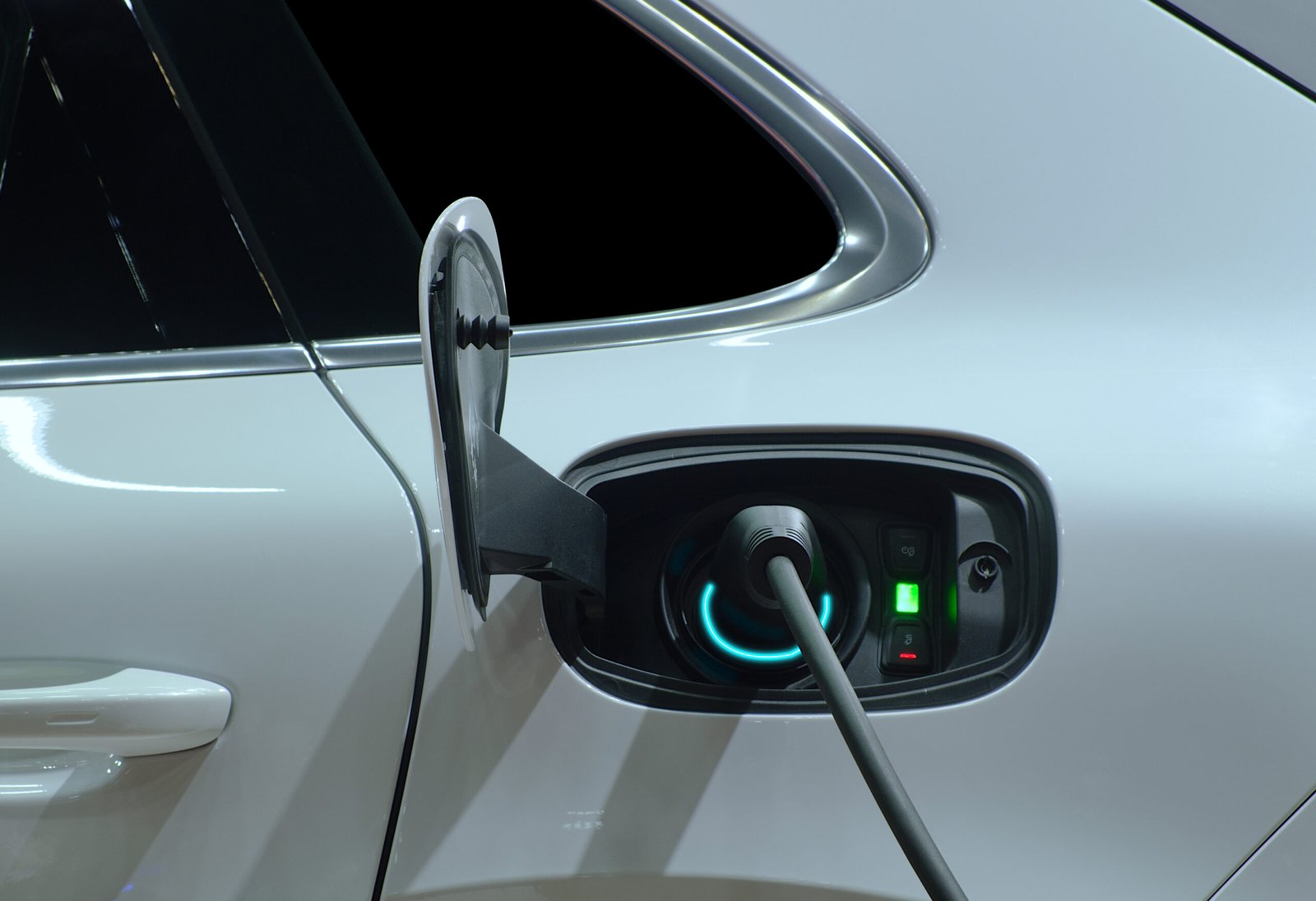 close-up-plug-electric-charging-machine-connected-with-socket-ev-car-recharge-battery