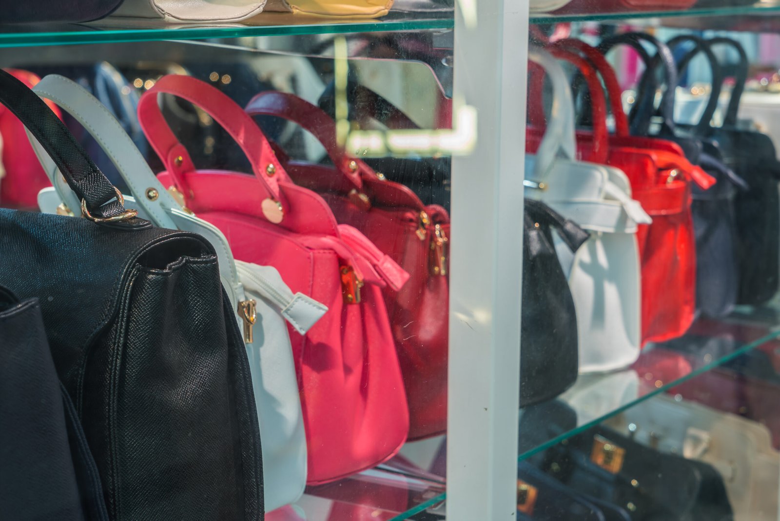 Row of Ladies leather handbags